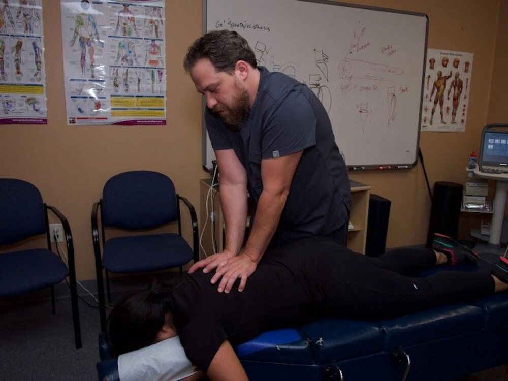 Hands-on chiropractic adjustment in the clinic